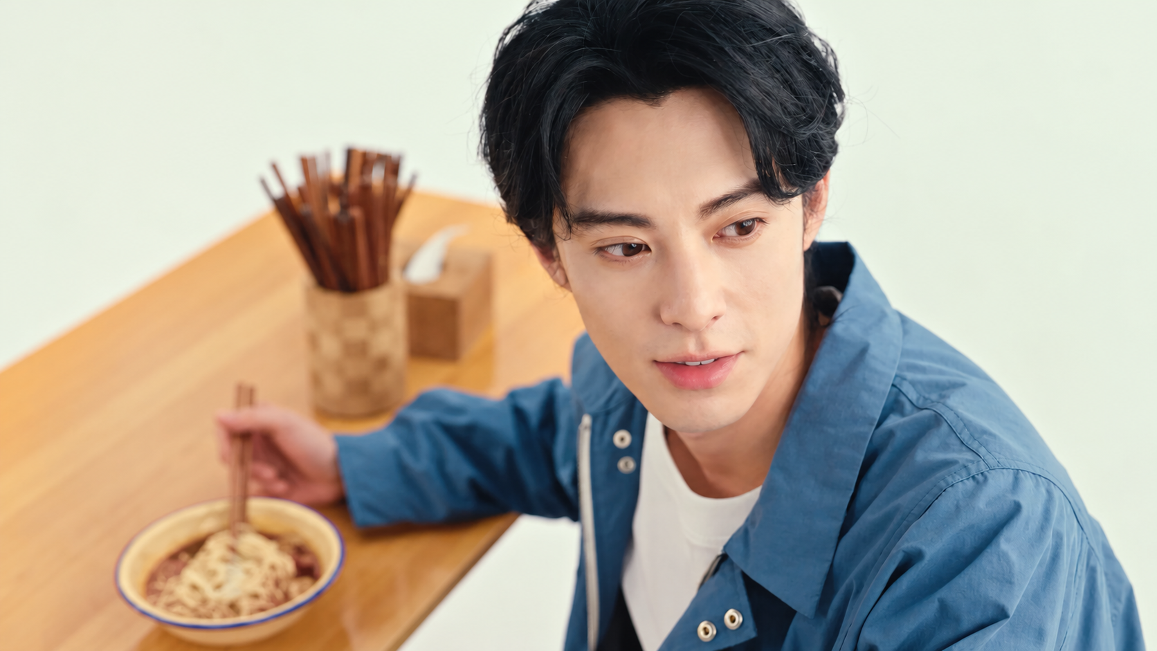 Dylan Wang at a noodle shop, from Amap Street Rank campaign.
